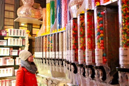 a person standing in front of a store